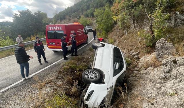 Araçla şarampole yuvarlandı, sağ salim çıktı